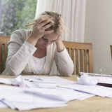 Woman worried about financial problems. Jobless or to many bills